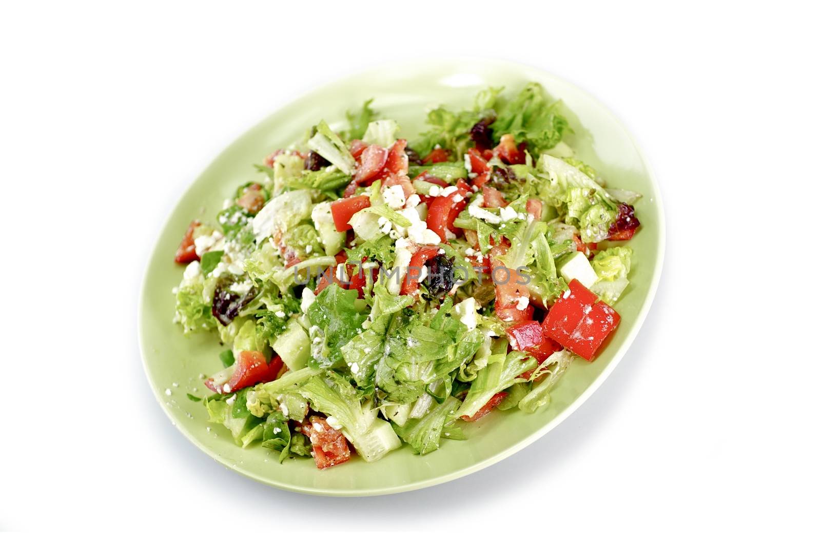Salad Plate Isolated on White. Fresh Vegetables Salad on Green Plate.