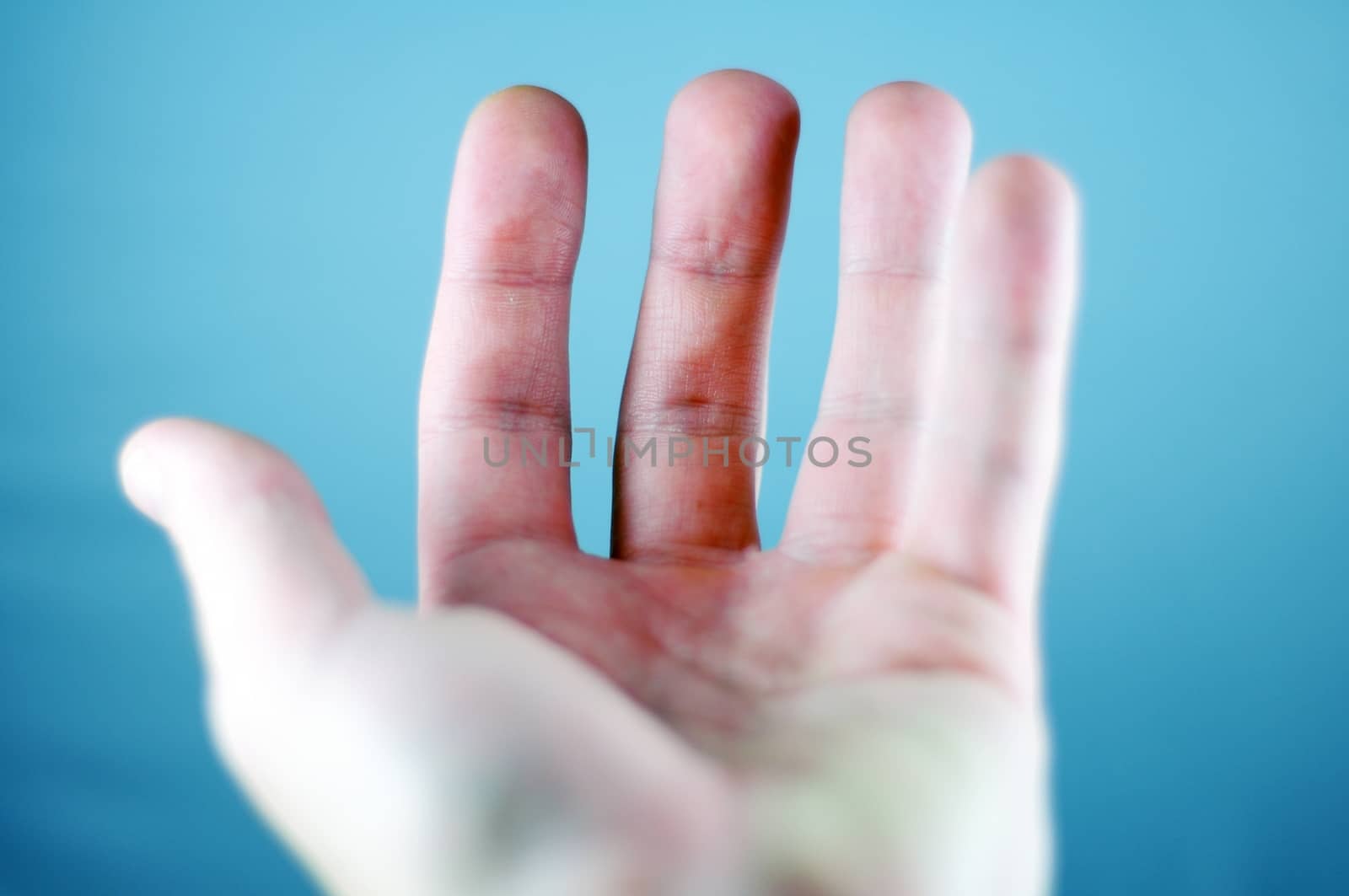 Open Male Hand - Cool Blue Background