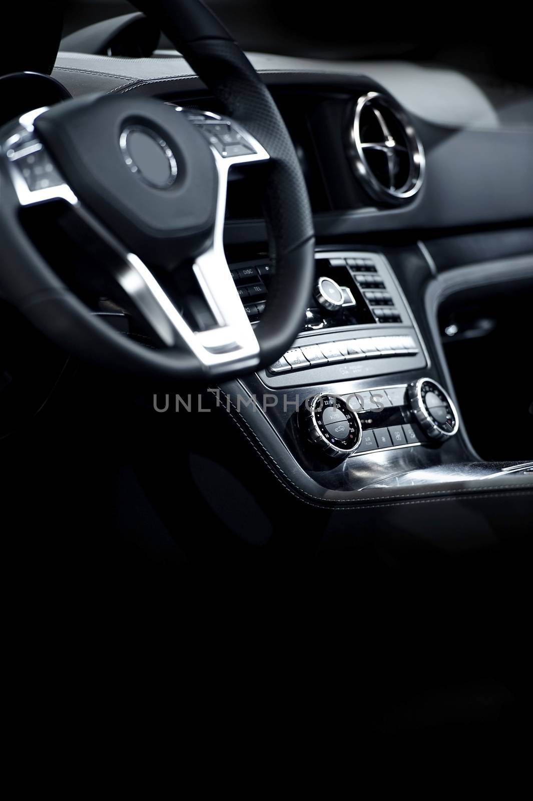 Elegant Modern Car Interior -Dark Leather Interior of Luxury Sport Vehicle. Vertical Photography