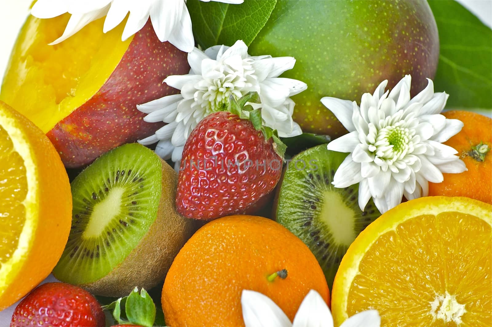 Fruits Mix. Kiwi Fruits, Oranges, Strawberries, Mandarine  and Mango. Flower Decoration