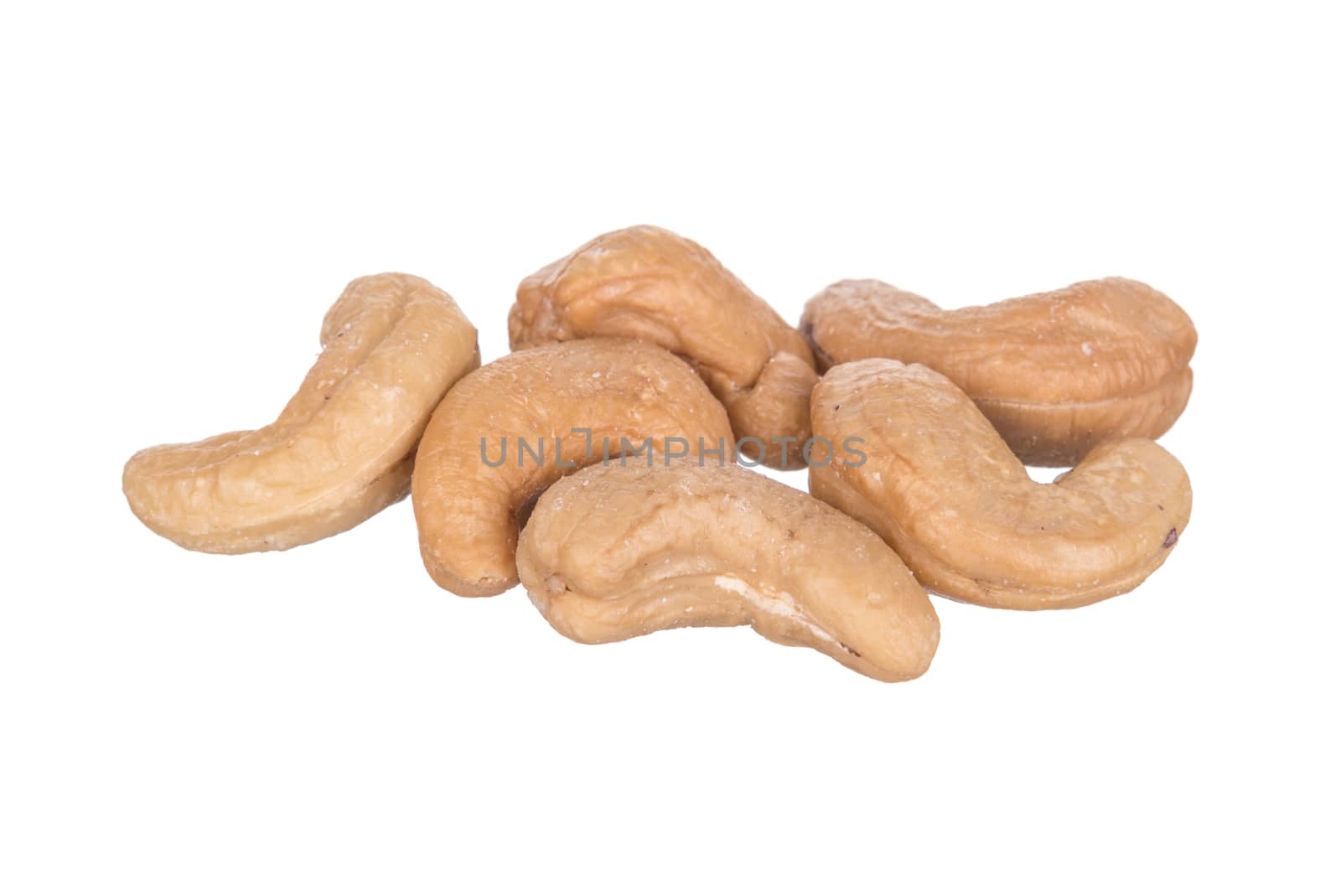 Salted cashew nut isolated on white background.