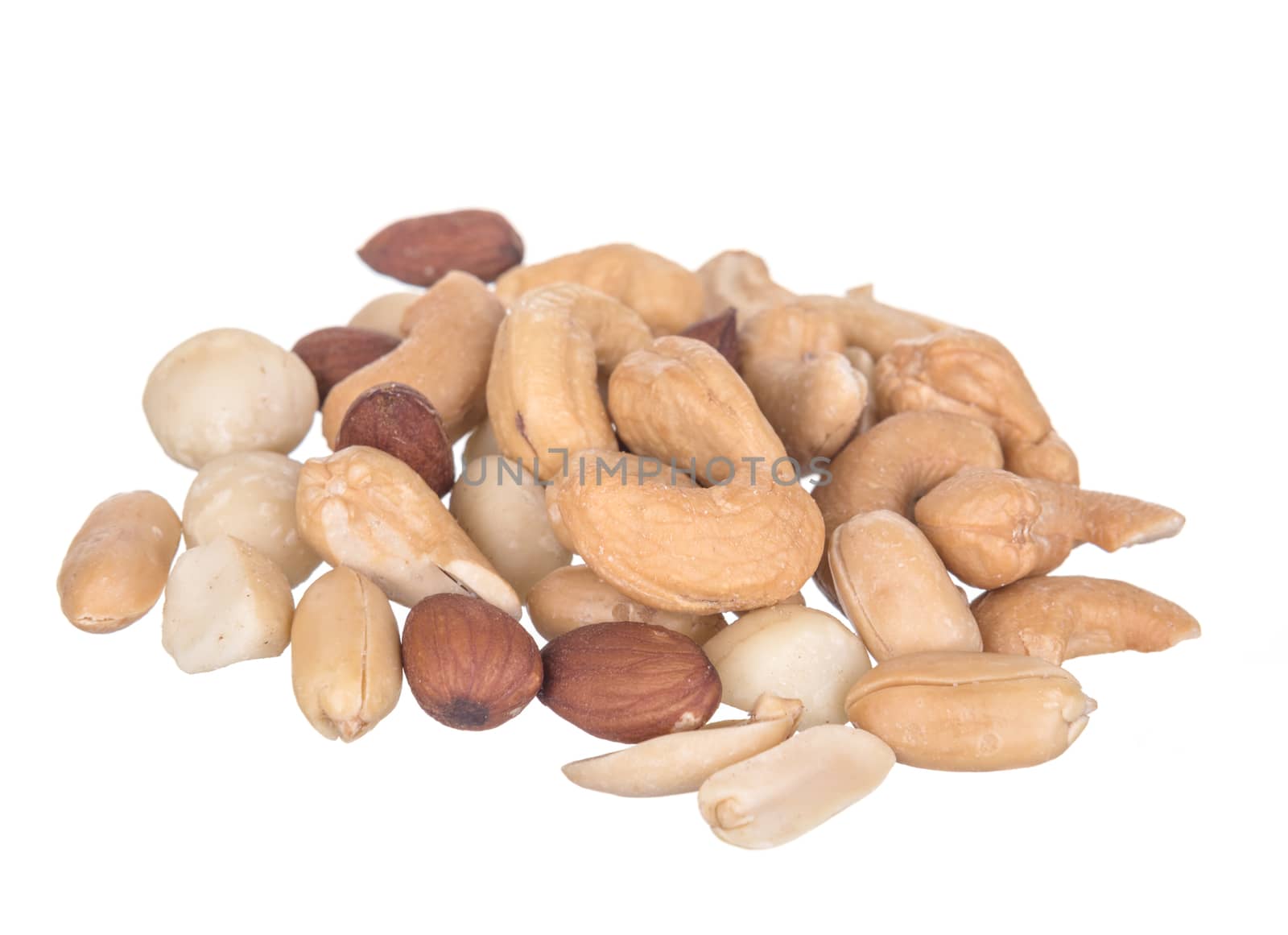 Salted cocktail nuts isolated on white background.