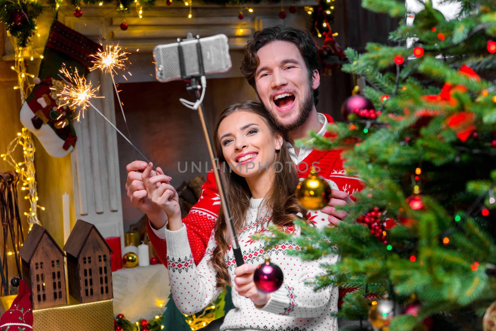 Couple taking selfie by LightFieldStudios