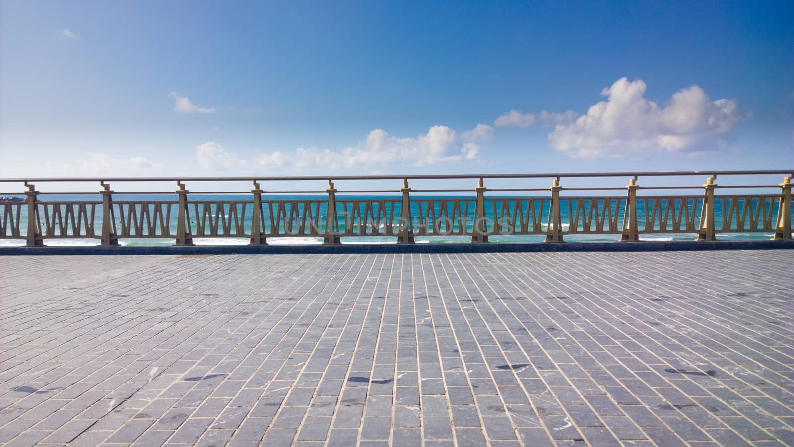 Promenade by the sea in summer