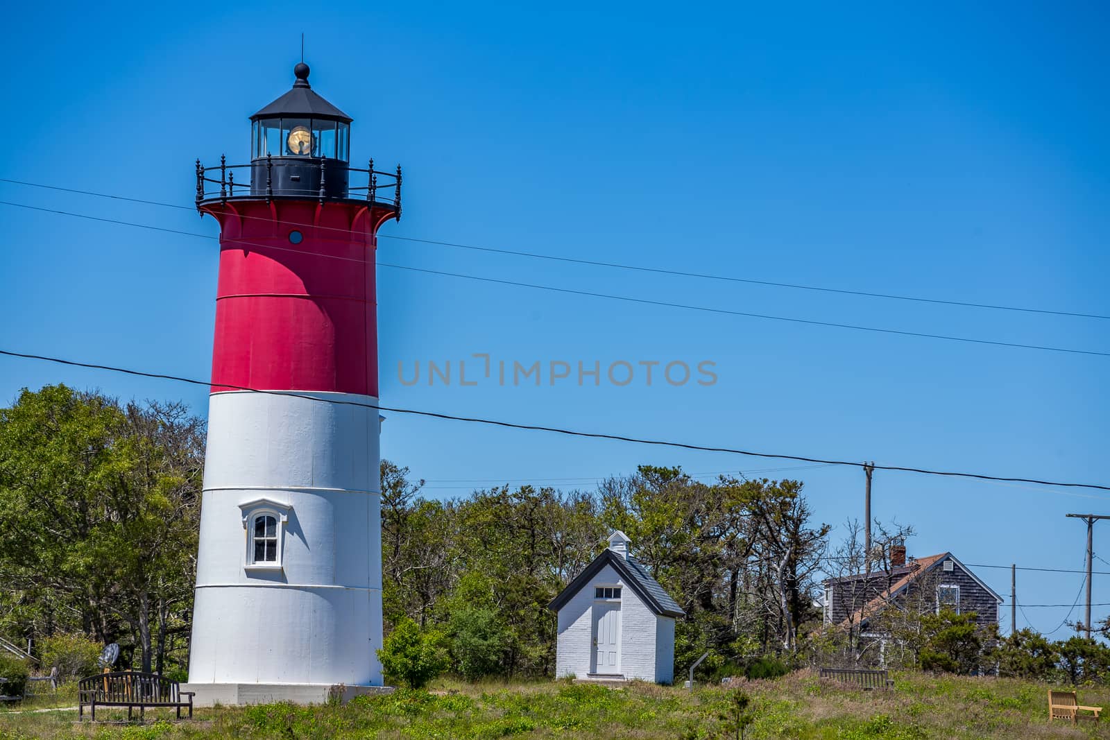 Nauset Light, officially Nauset Beach Light, is a lighthouse in Eastham, Massachusetts. It is a cast iron plate shell lined with brick and stands 48 feet high.