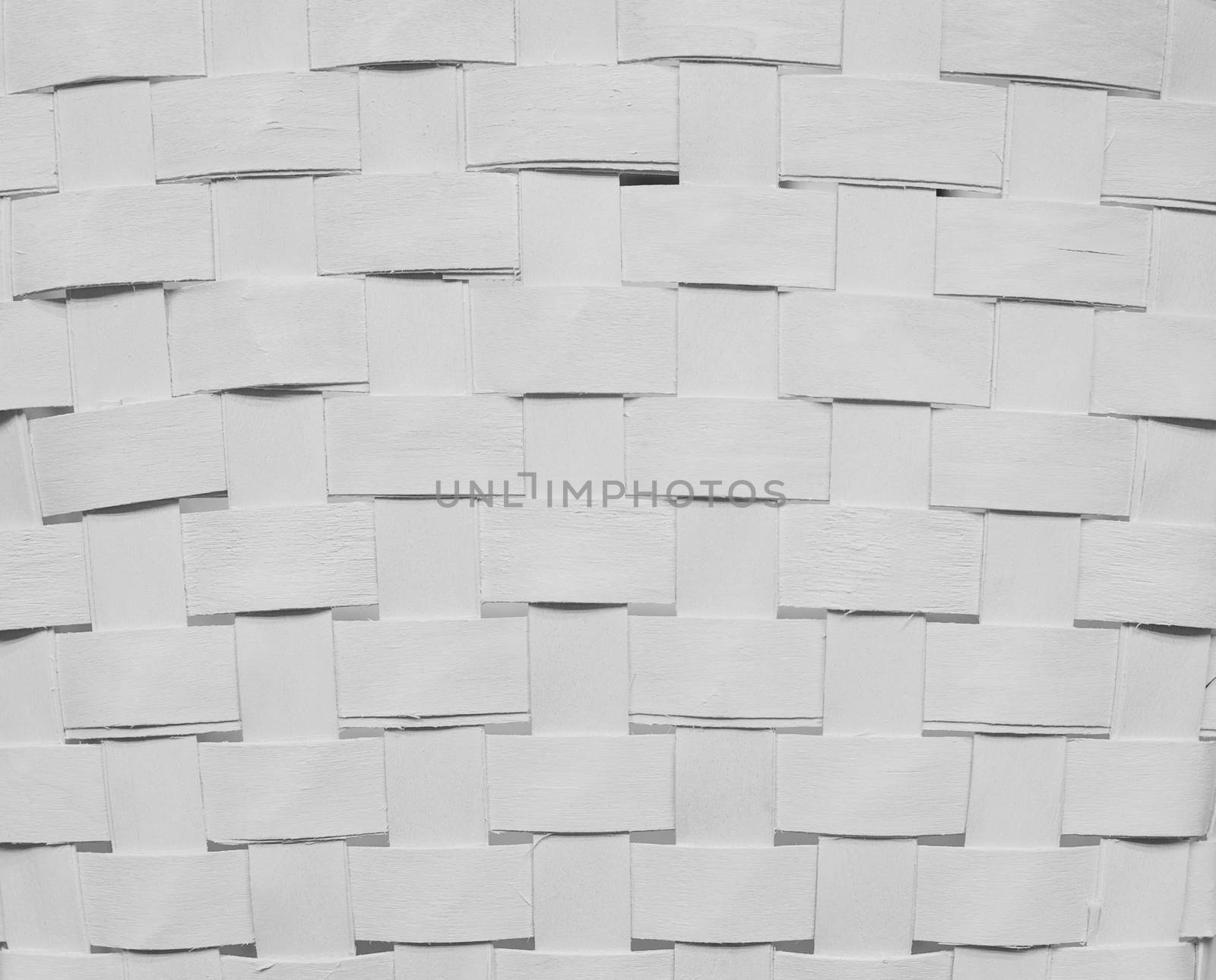 Texture of white woven paper strips for background by timonko