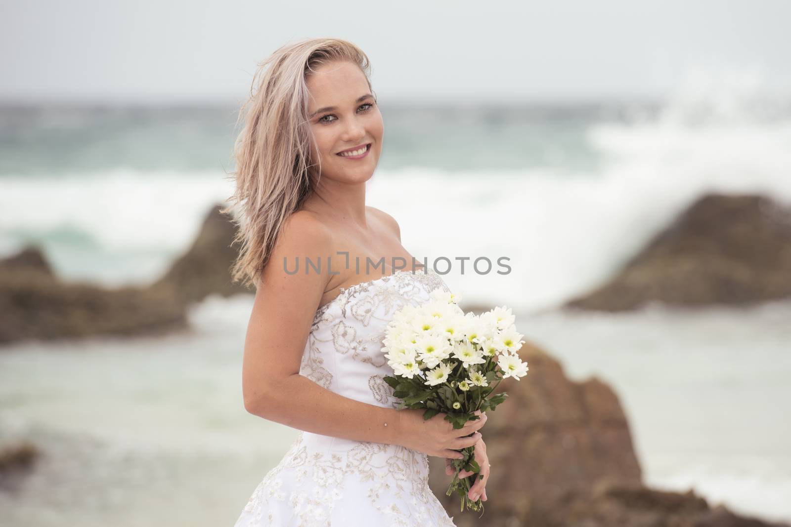 Bride at Snapper Rock beach in New South Wales. by artistrobd