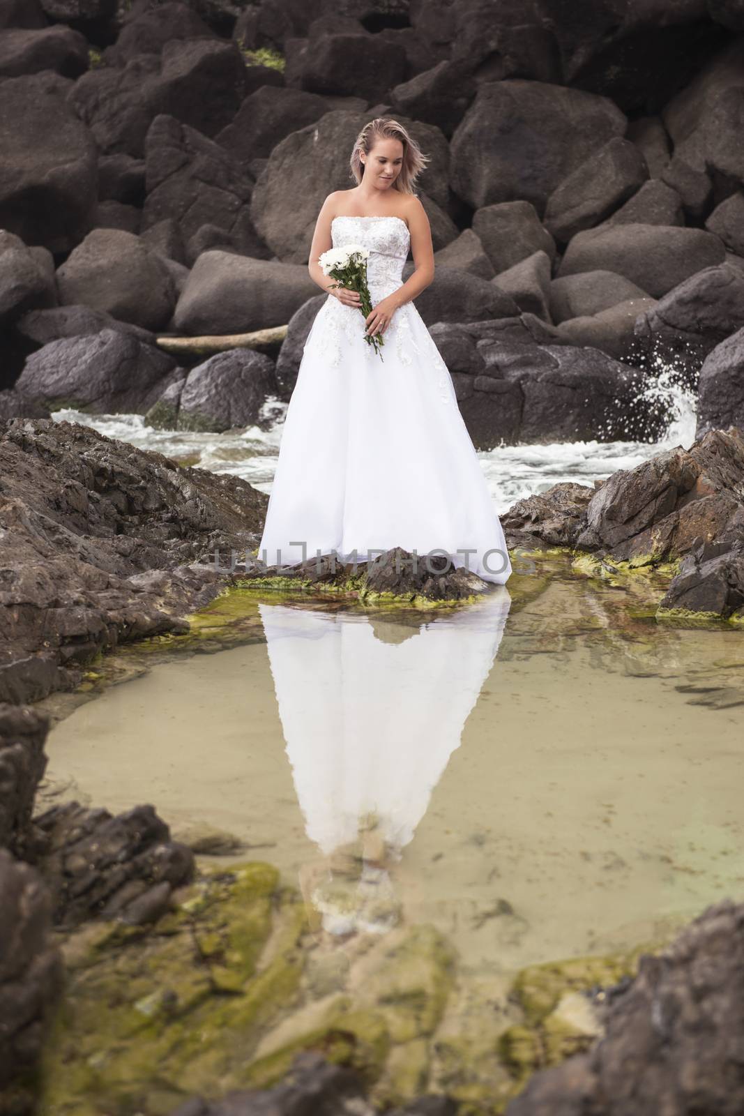 Bride at Snapper Rock beach in New South Wales. by artistrobd