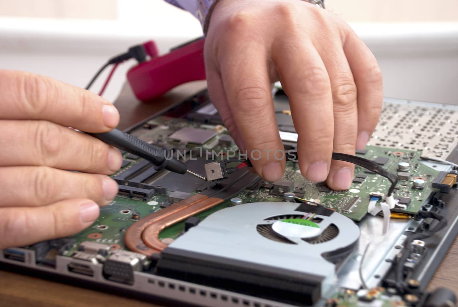 Broken computer repair with the instrument.Laptop Disassembling