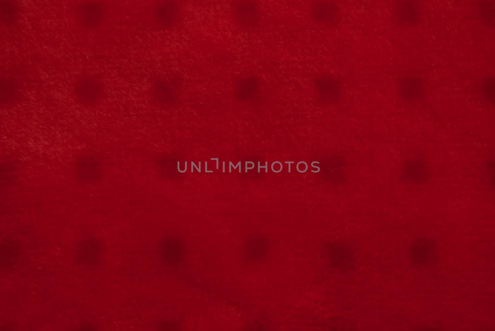 Close up of red colored textile texture for background