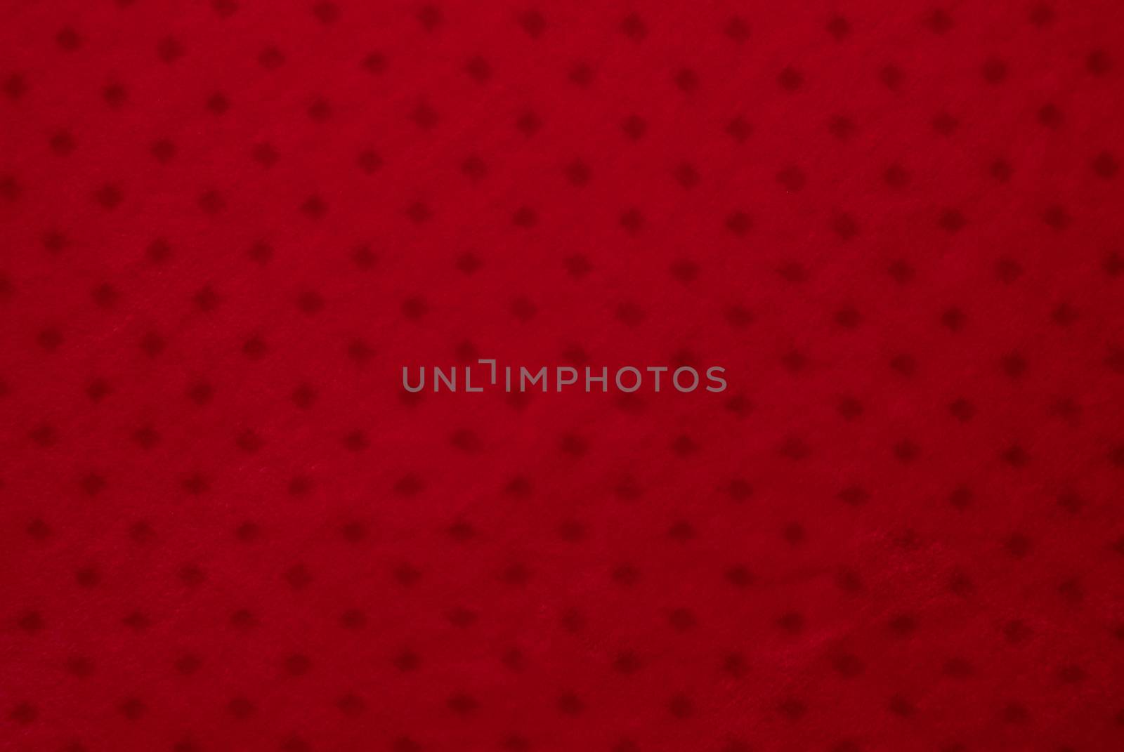 Close up of red colored textile texture for background