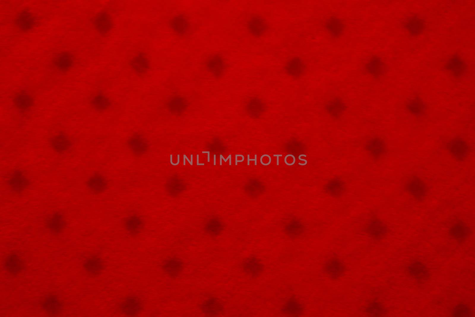 Close up of red colored textile texture for background