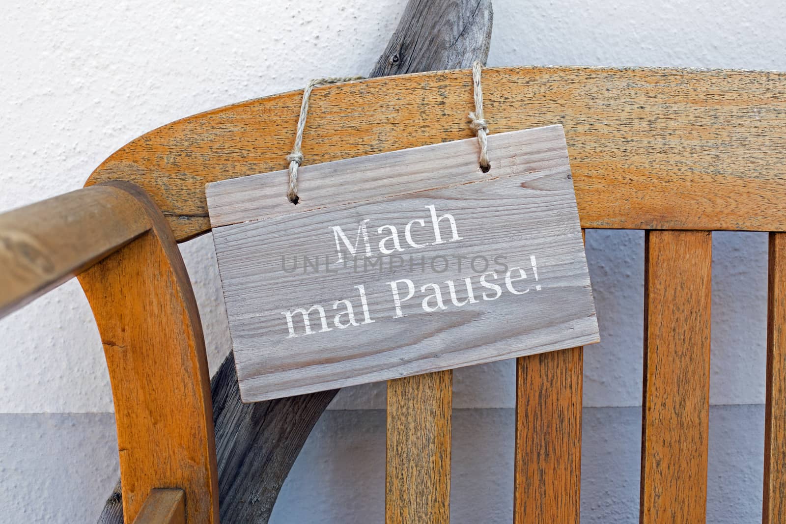 Bench and german sign with the german words for make a break