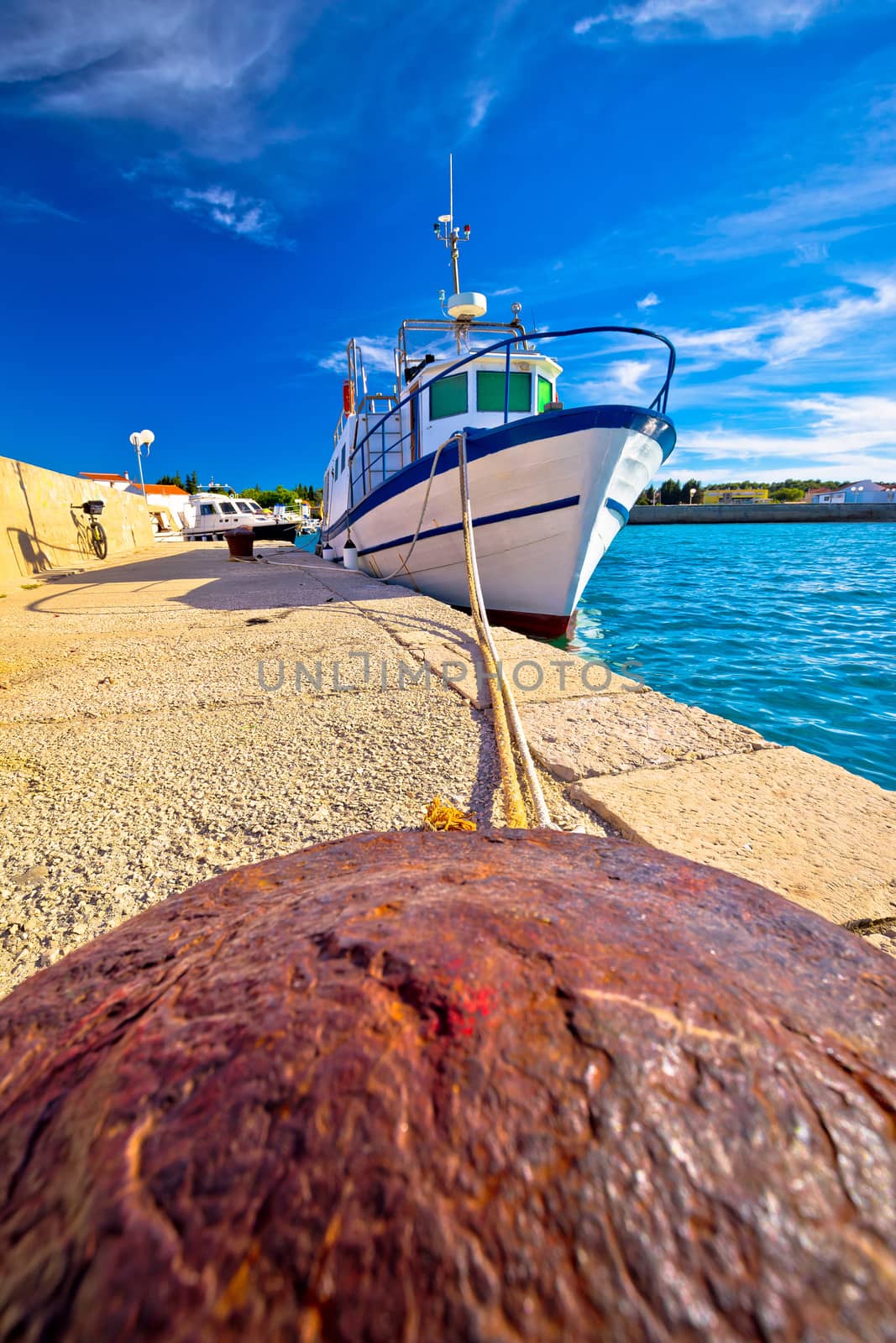 Boat on mooring bollard in Ugljan island village, Dalmatia, Croatia