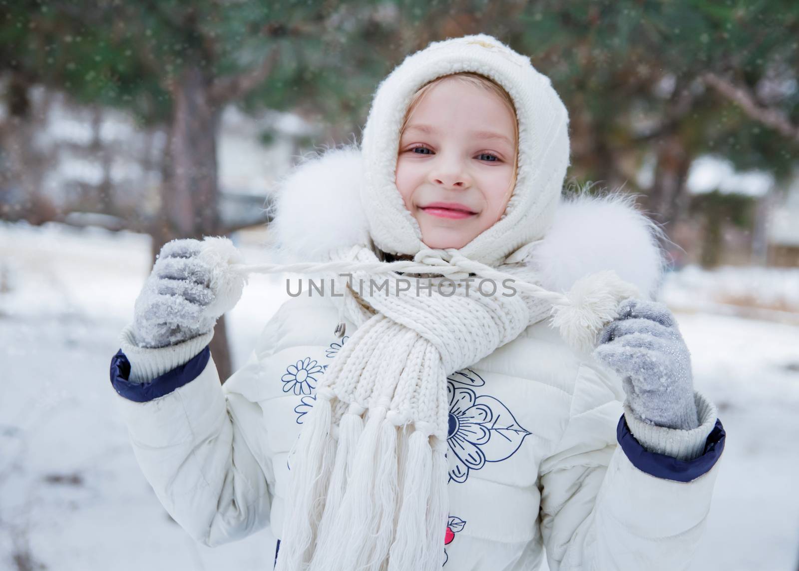 Girl having fun outdoors in winter park by Angel_a