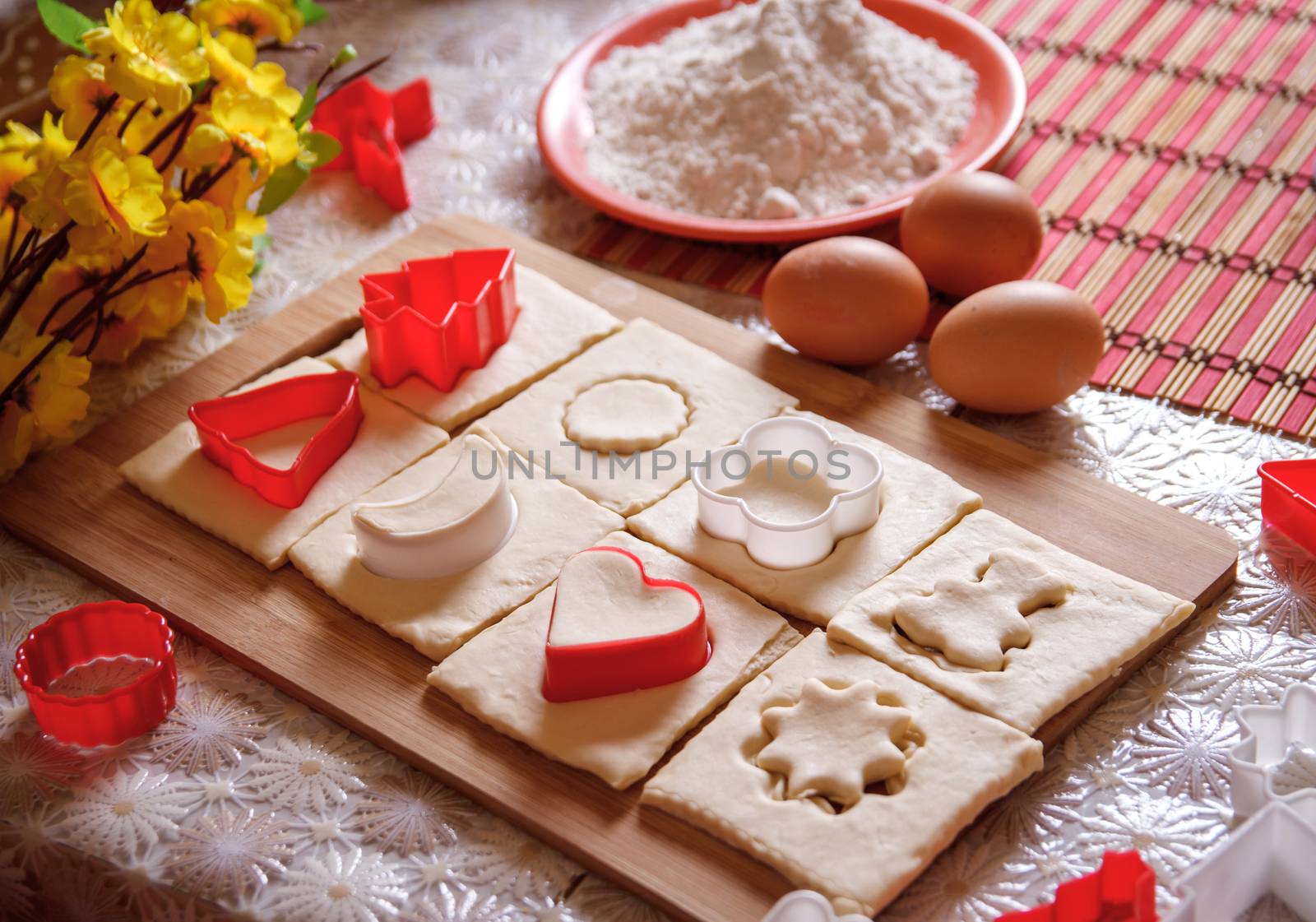 Kitchen table with dough and ingredients by Angel_a