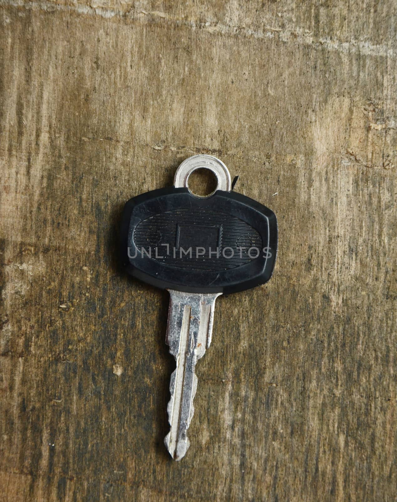 Key on a wood, picture of an old 