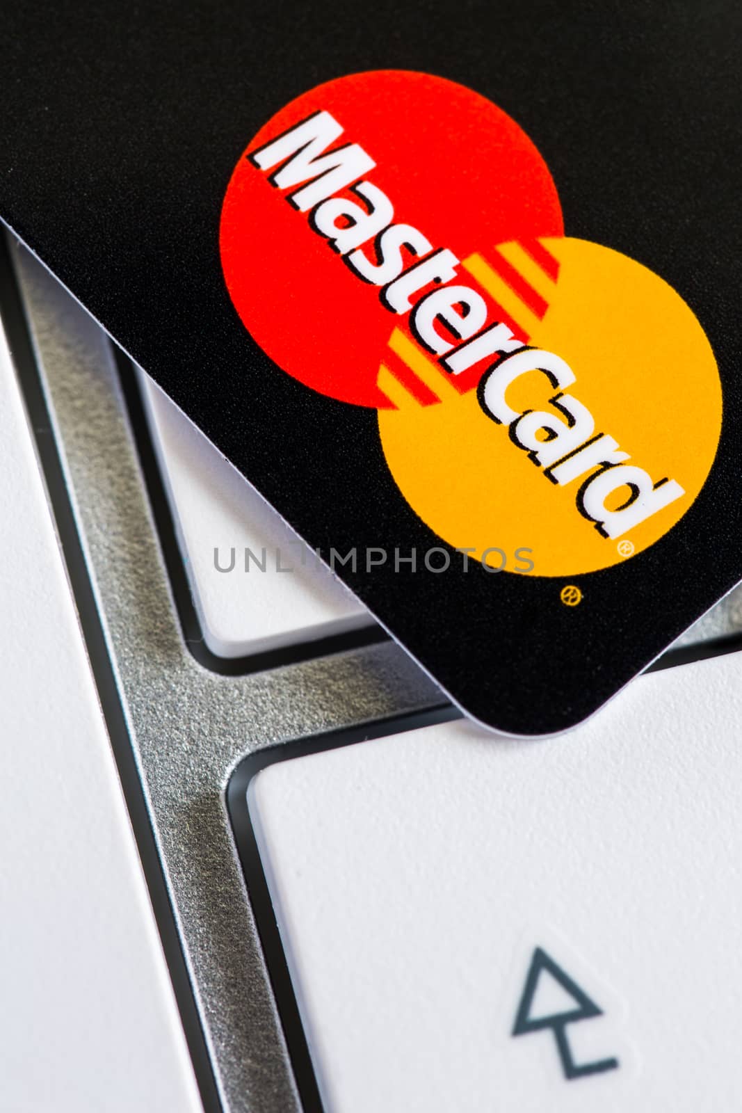 Benon, France - Feb 08, 2017: MasterCard credit card on keyboard, close up photo