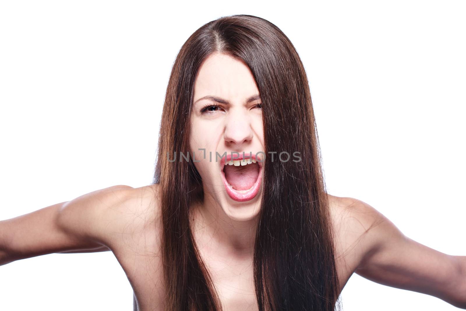 portrait of a brunette girl screaming at the camera