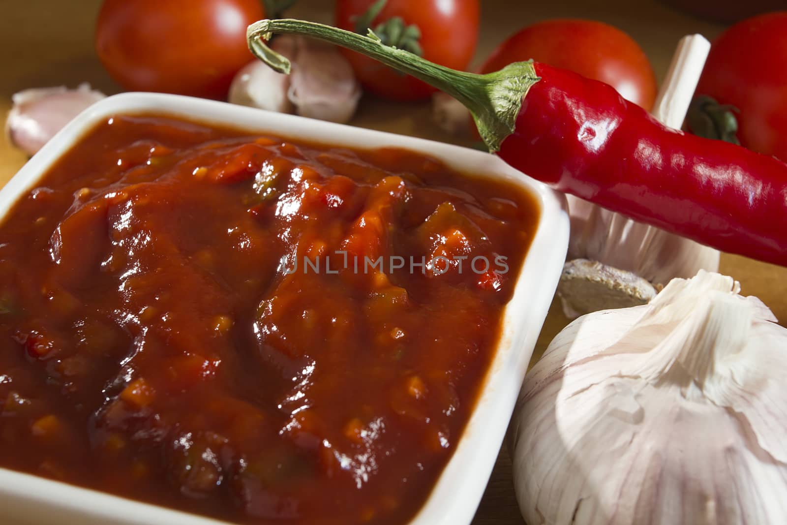 Tomato sauce with hot peppers, garlic and onion