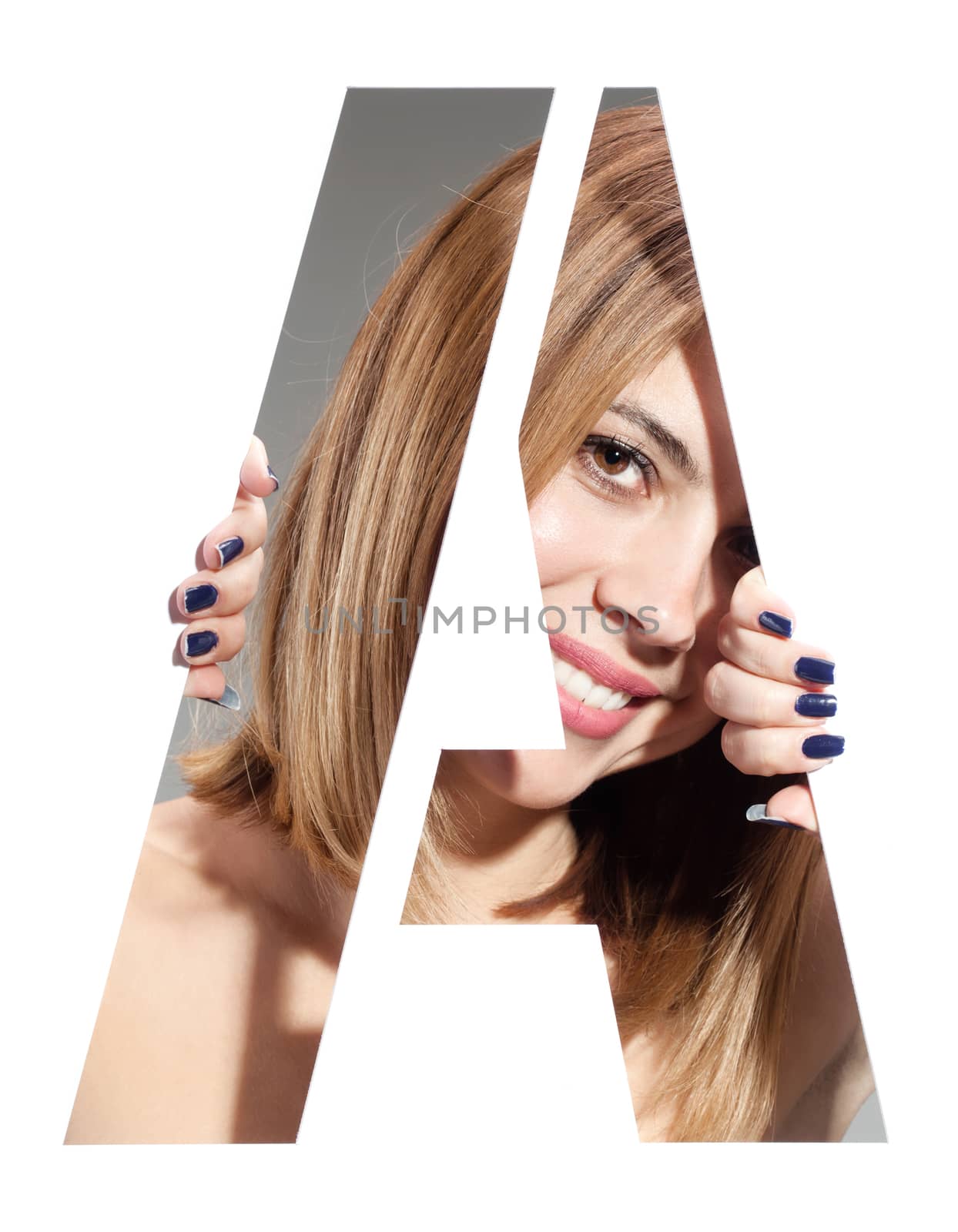 girl hiding behind and holding the letter "A"