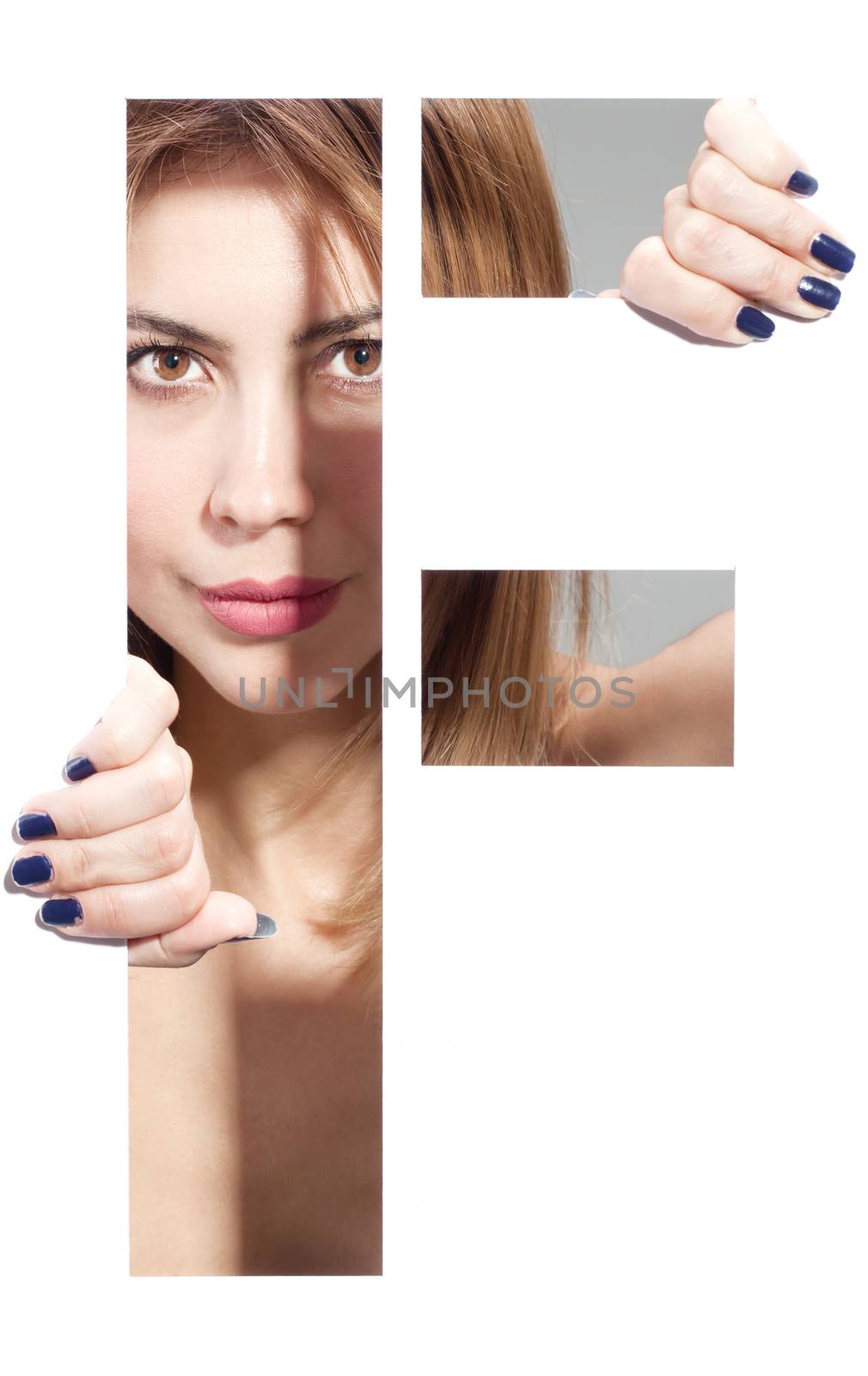 girl hiding behind and holding the letter "F"