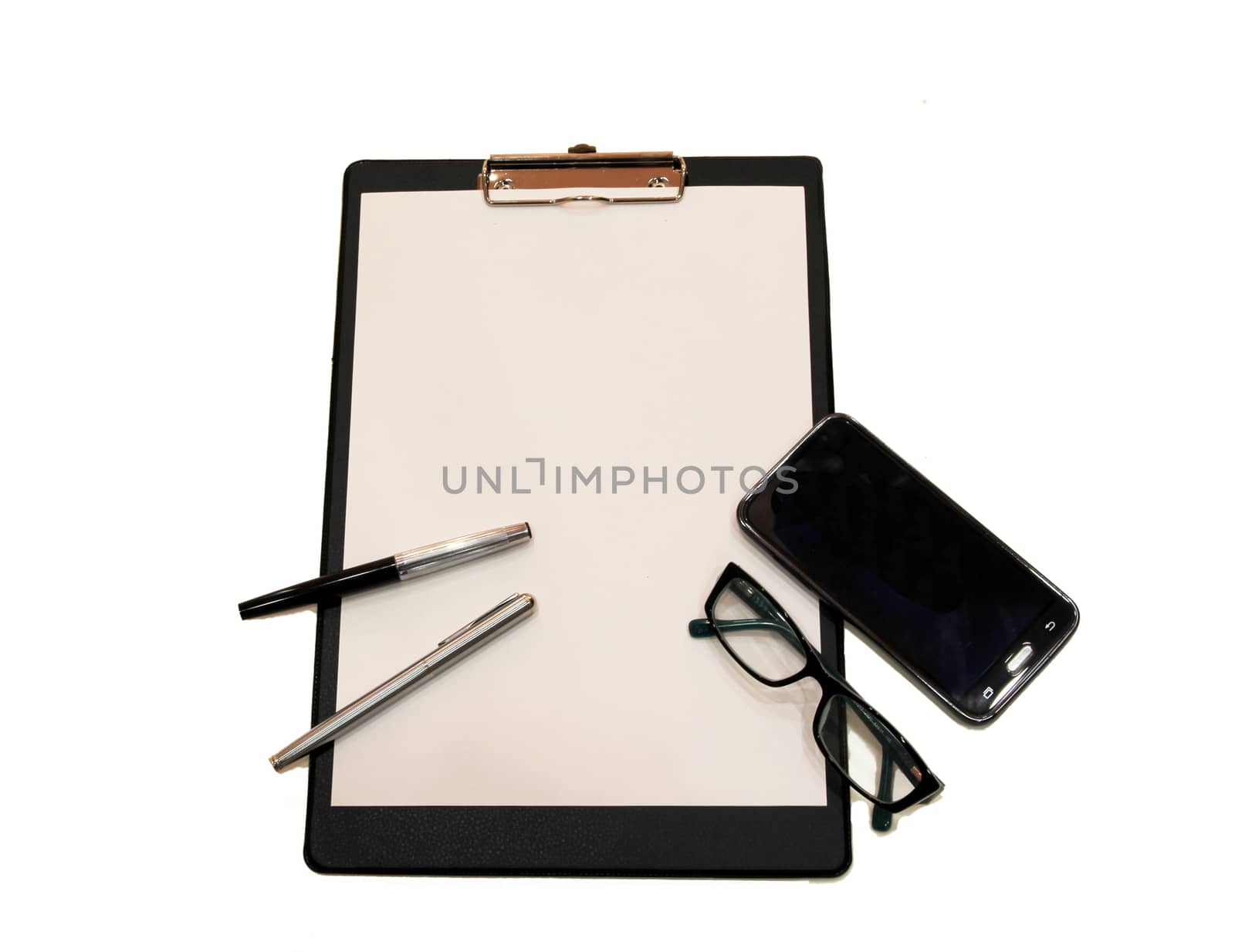 A white sheet of paper with a pen and smartphone on white background