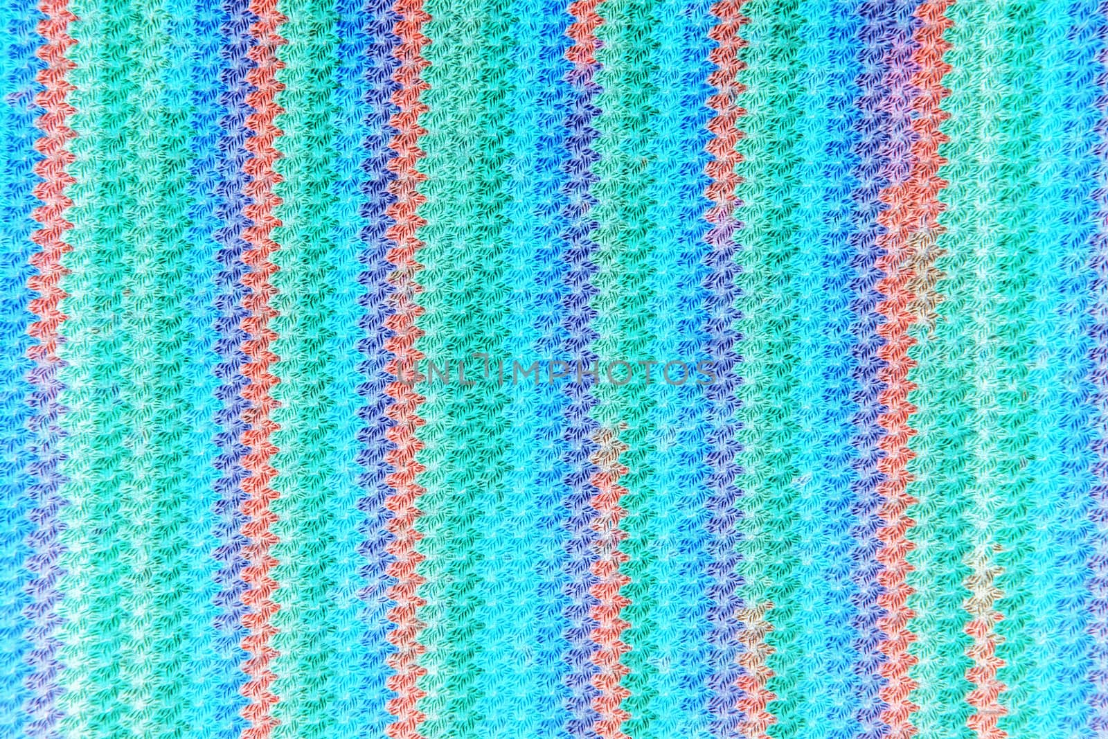 Colorful rainbow knitting background close up