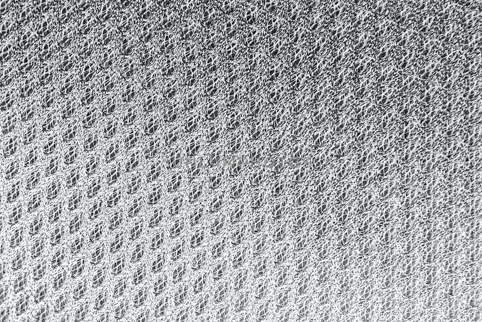 Texture background of polyester fabric. Plastic weave fabric pattern