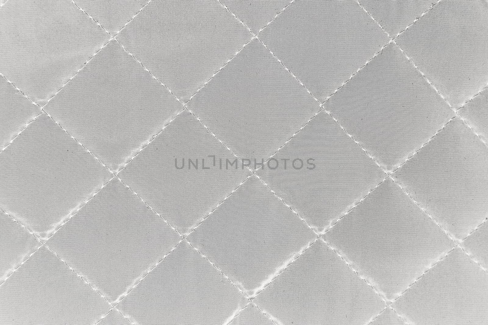 Quilted synthetic fabric texture background. by natazhekova