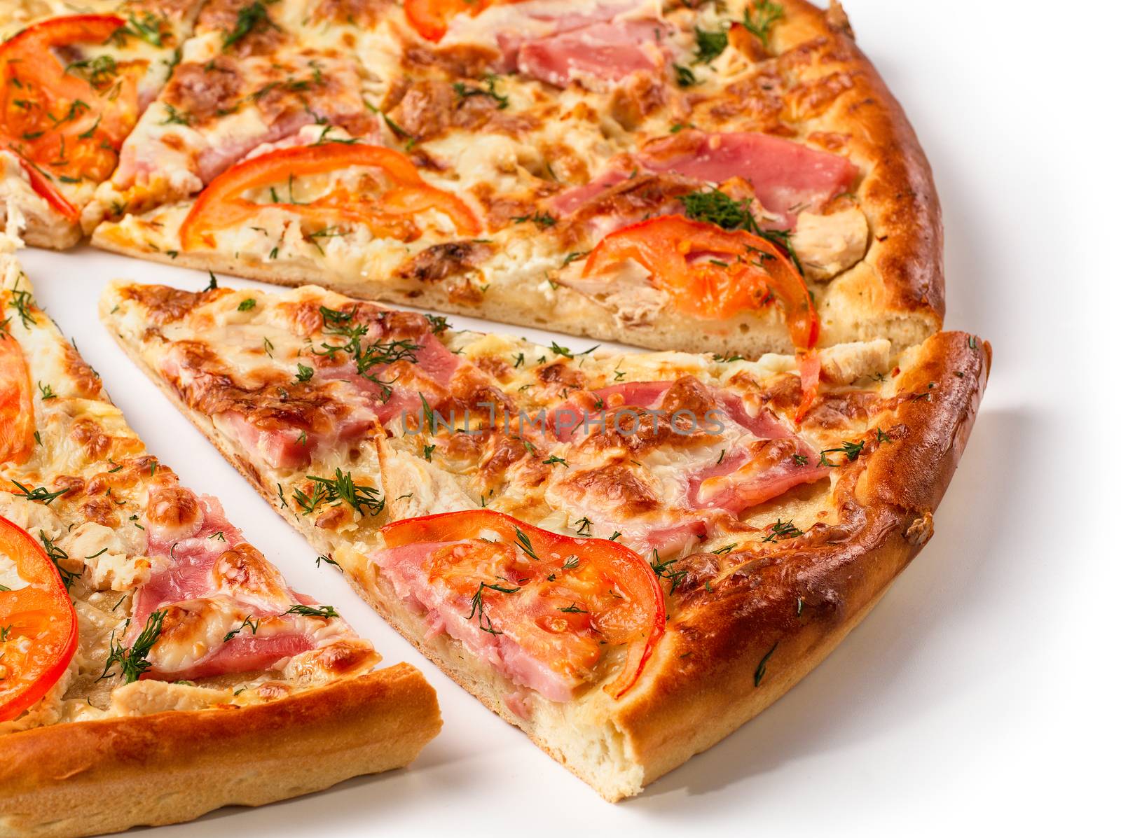 Close up view on piece of pizza with ham. Isolated on white with clipping path