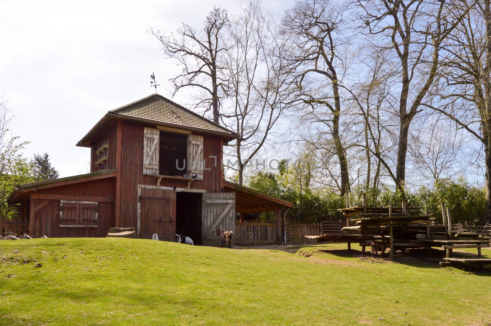 Stable and dovecote gathered on a small coast in a wildlife park in France