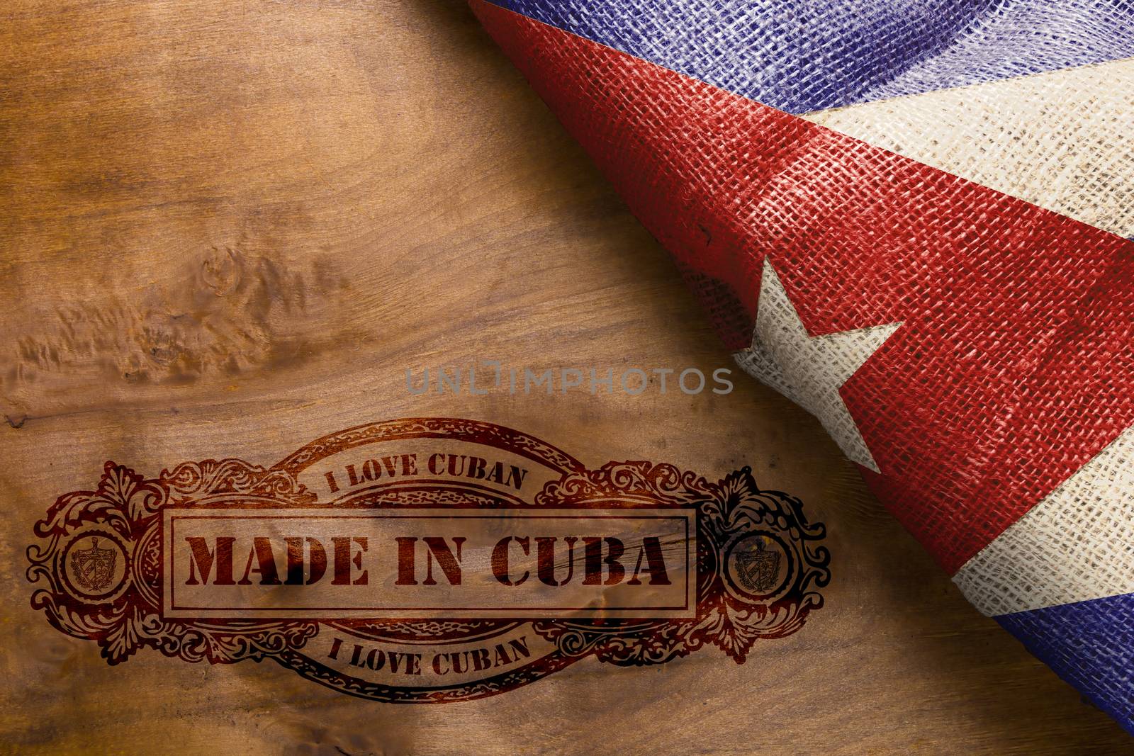 Vintage hot imprint on a wooden surface Made in Cuba.