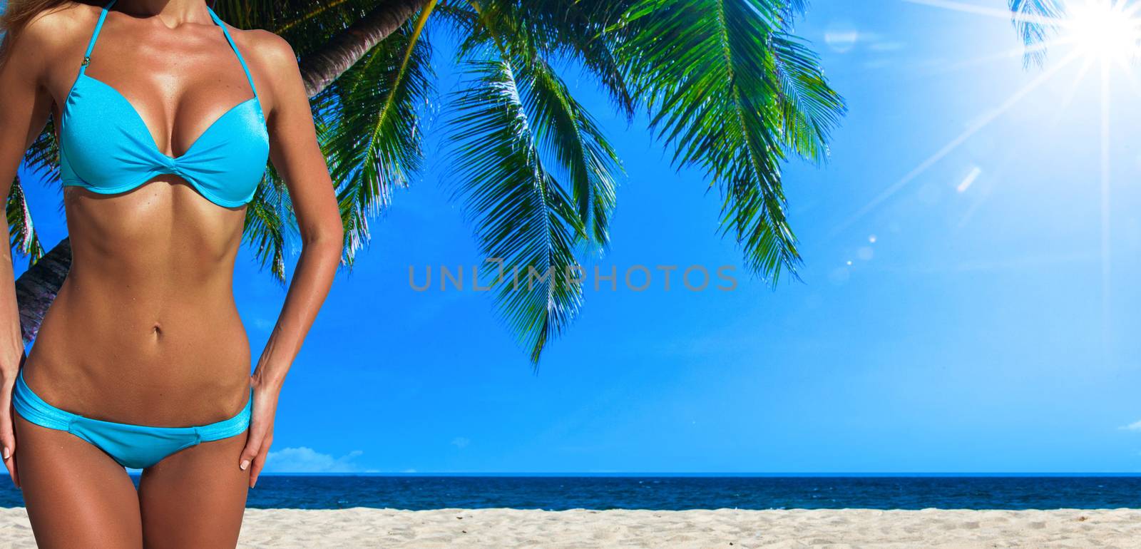 Sexy woman body on tropical sea beach background