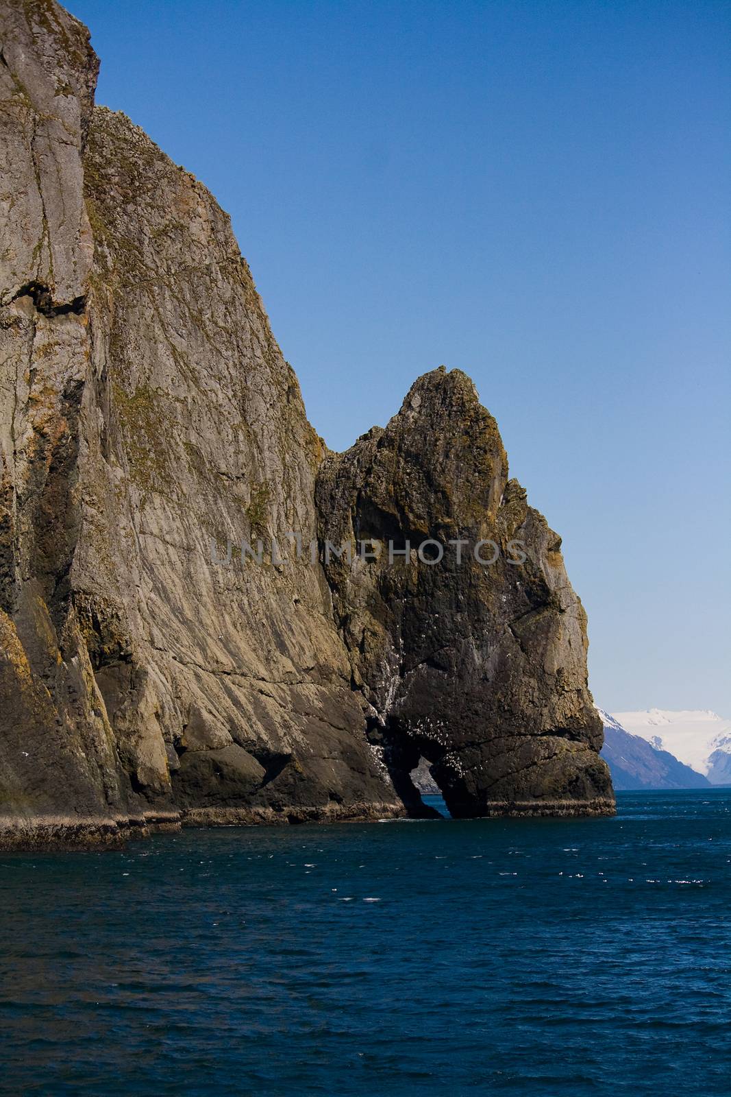 An interesting rock formation juts out of the ocean near Seward, Alaska. 