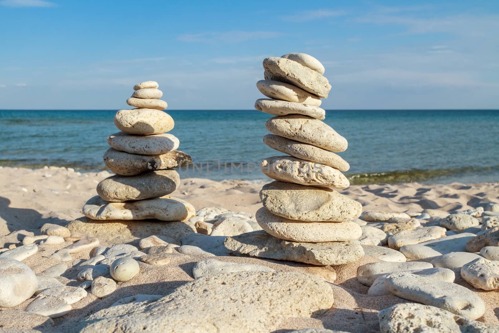 stone piles on the beach by fogen