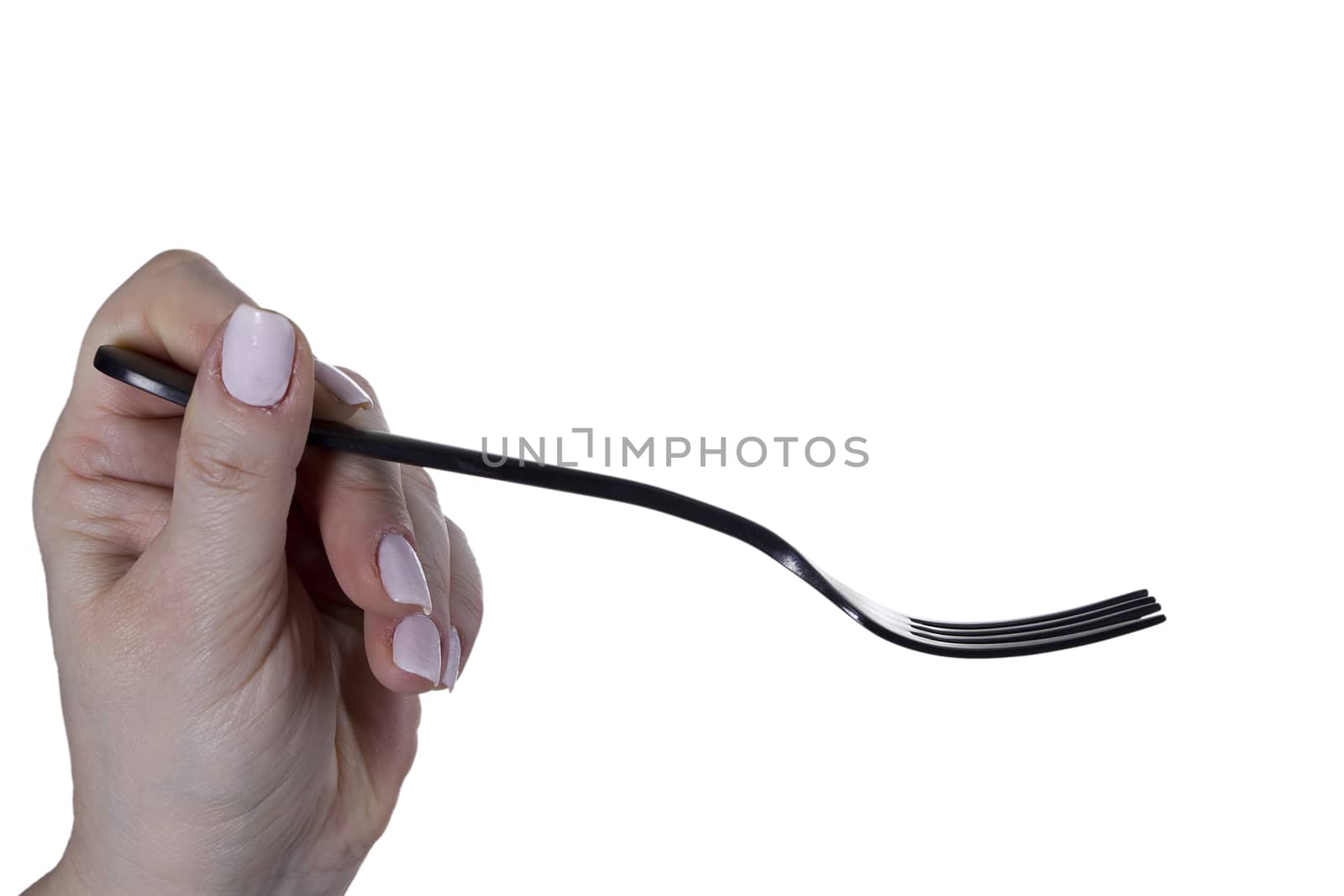 Plug in a female hand on a white background