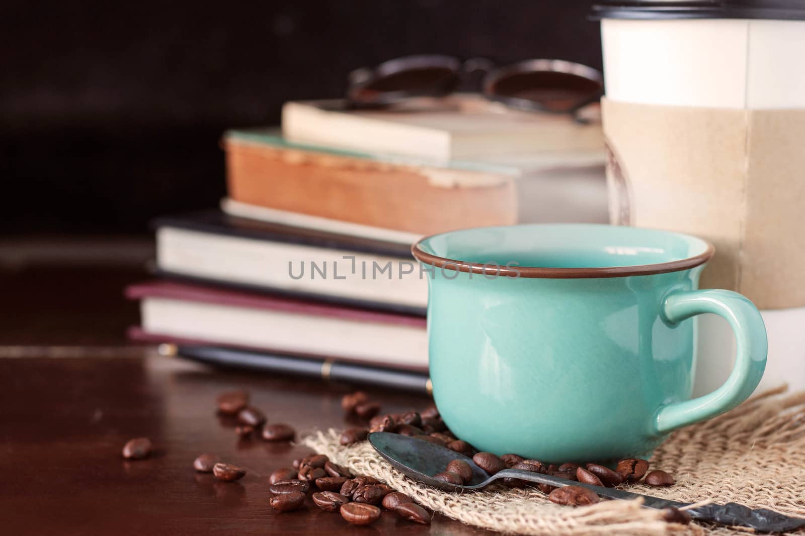 coffee cup on the desk. by start08