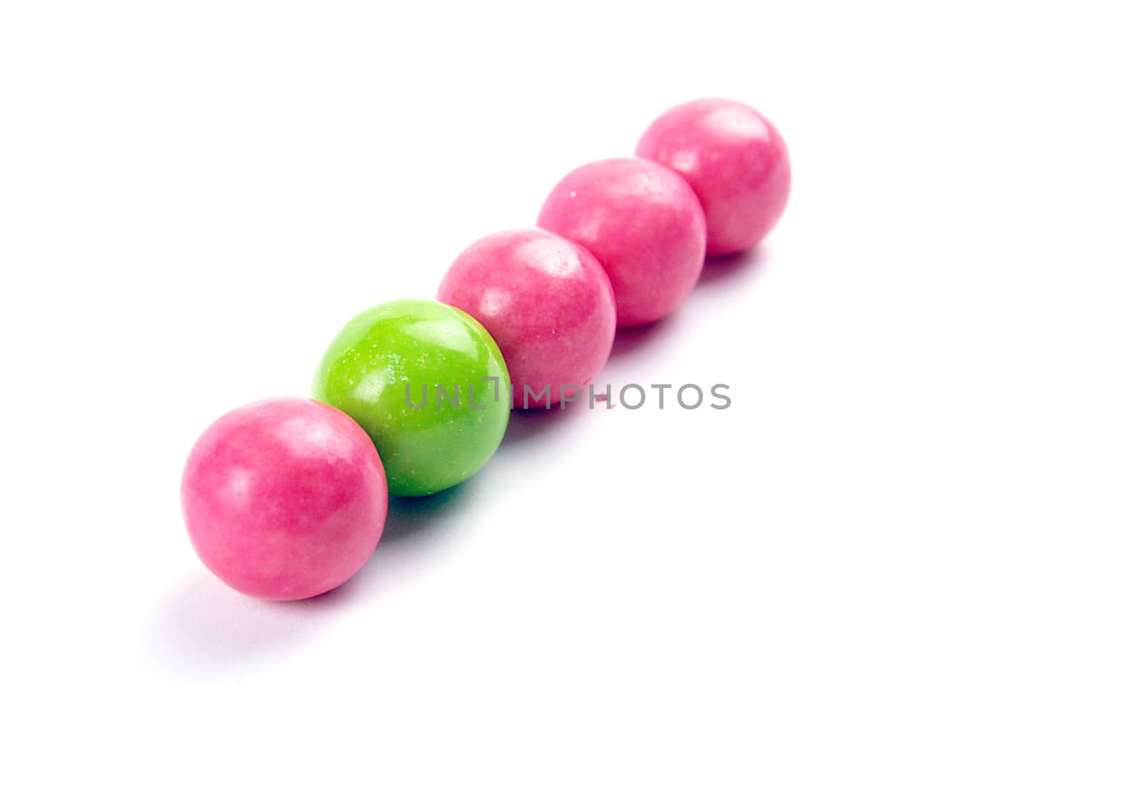 A pile of colorful gumballs on a white background. by nehru