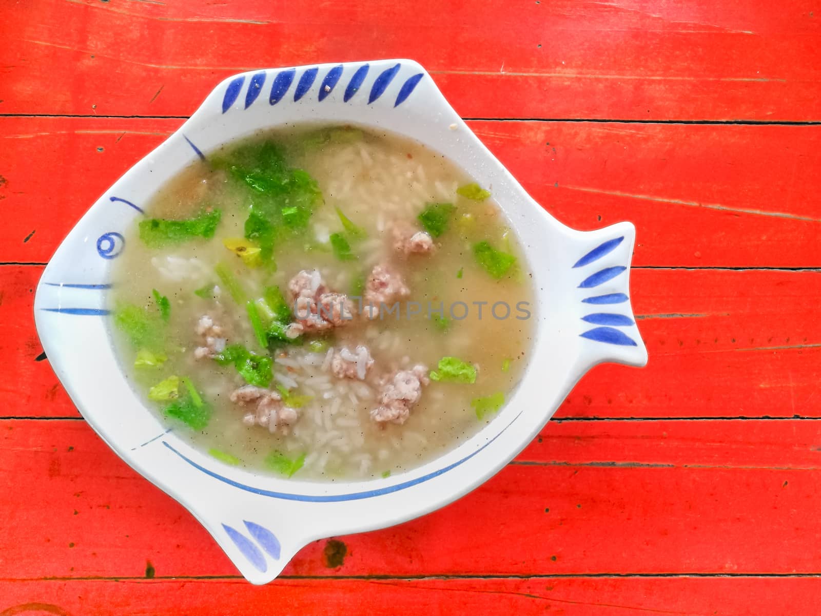 pork rice soup in a bowl