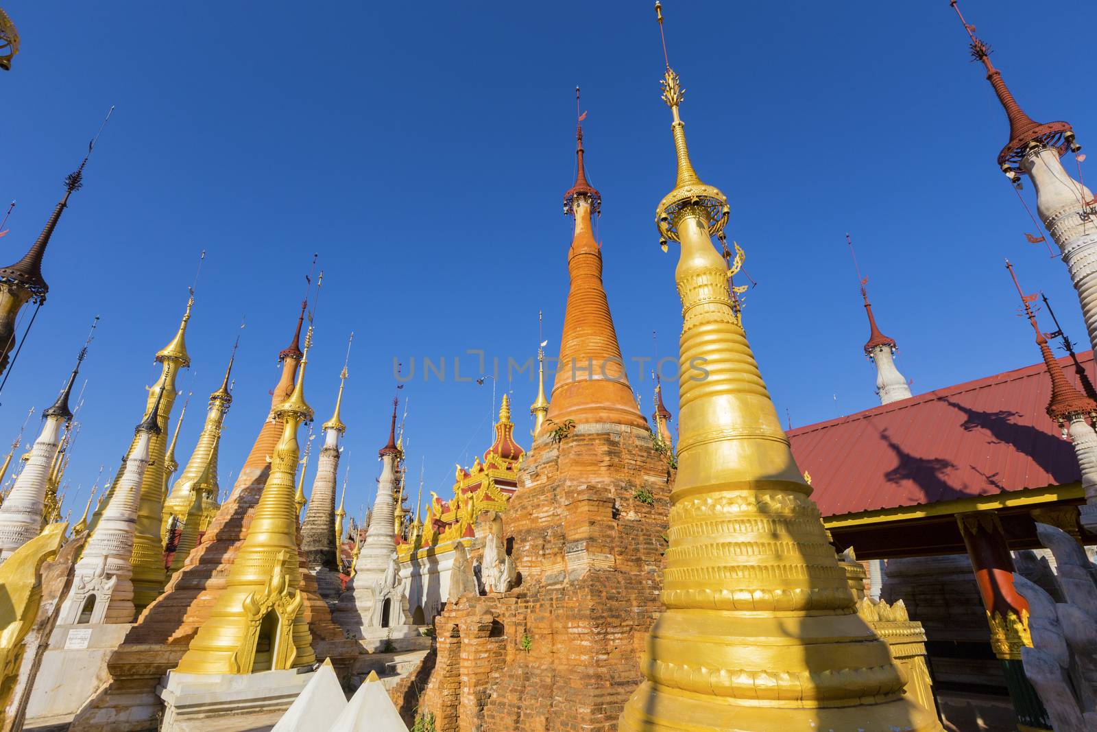 Ruins of ancient Burmese Buddhist pagodas Nyaung Ohak in the village of Indein on Inlay Lake in Shan State, Myanmar, Burma)