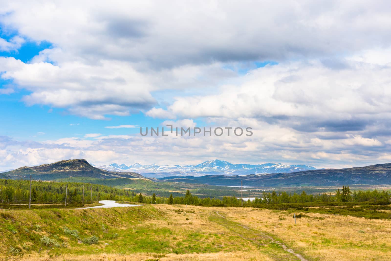 Landscape with mountains and clouds in Rondane, Norway