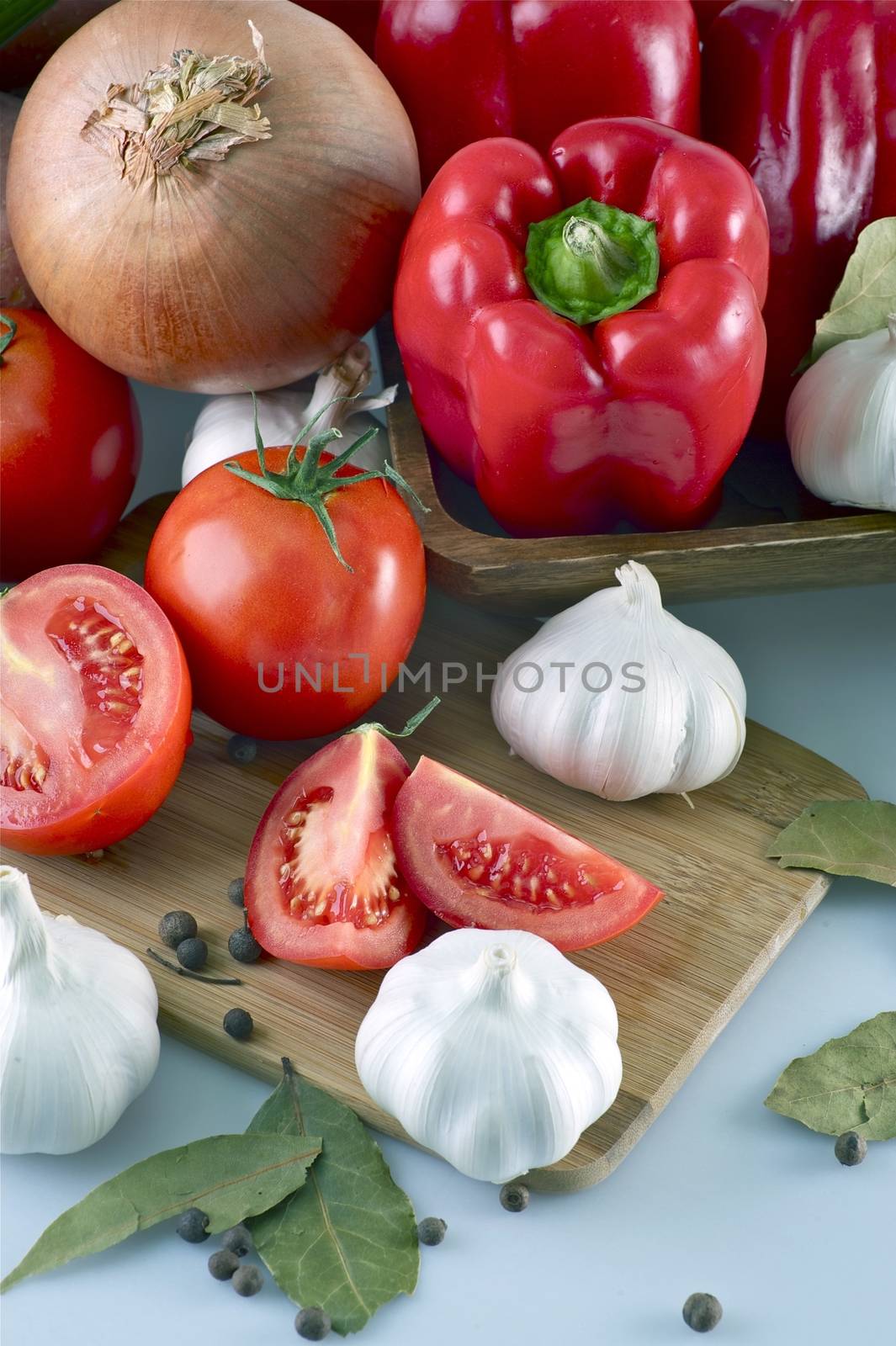 Vegetables Vertical Studio Photo. Vegetables like Onion, Garlic, Tomatoes and Red Paprikas. Fresh Vegetables.