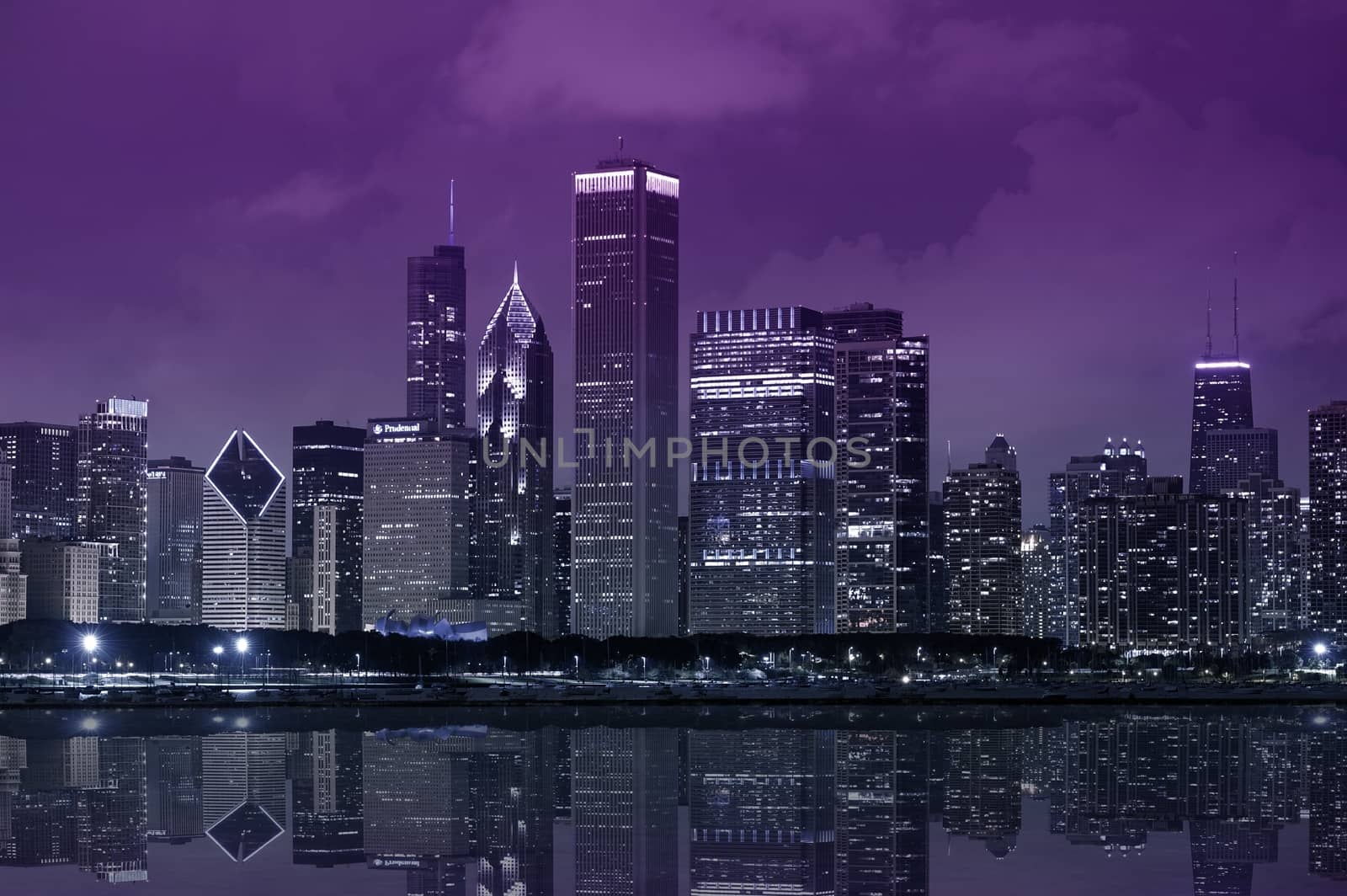 Chicago Lake Front - Chicago Skyline with Lake Michigan. Purple Dark Sky. Panoramic Photography.