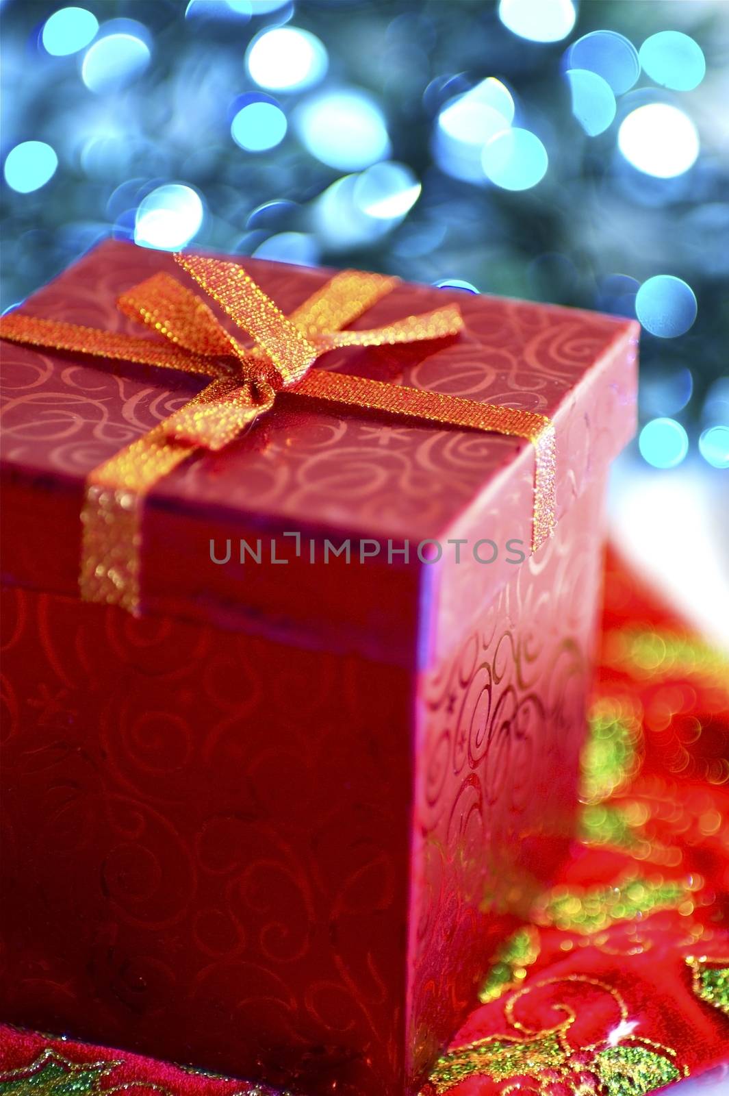 Christmas Presents. Red Christmas Present Box. Blue Lights Bokeh.