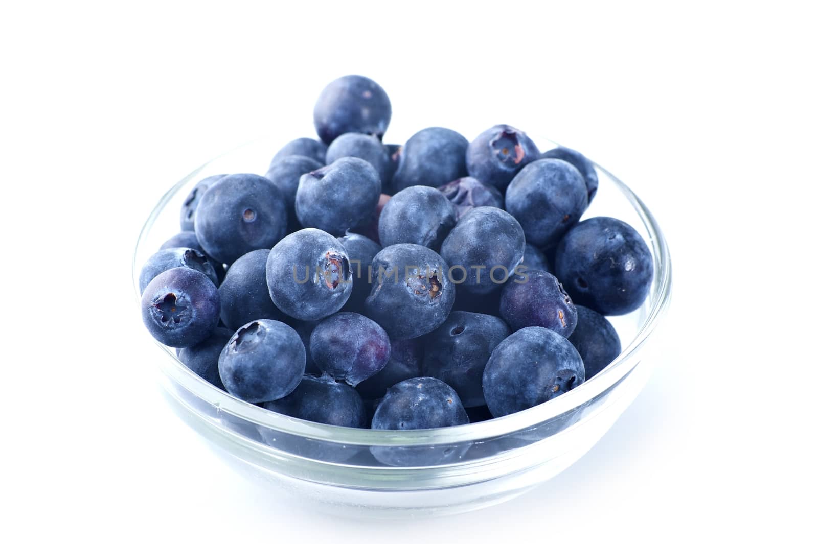 Small Glass Bowl with Fresh Blueberries. Blueberries Isolated on White Horizontal Photo.