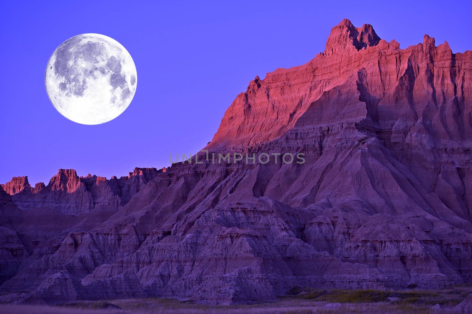 Full Moon in the Badlands National Park, South Dakota, USA. Eroded Moon-Like Sandstones Landscape. 