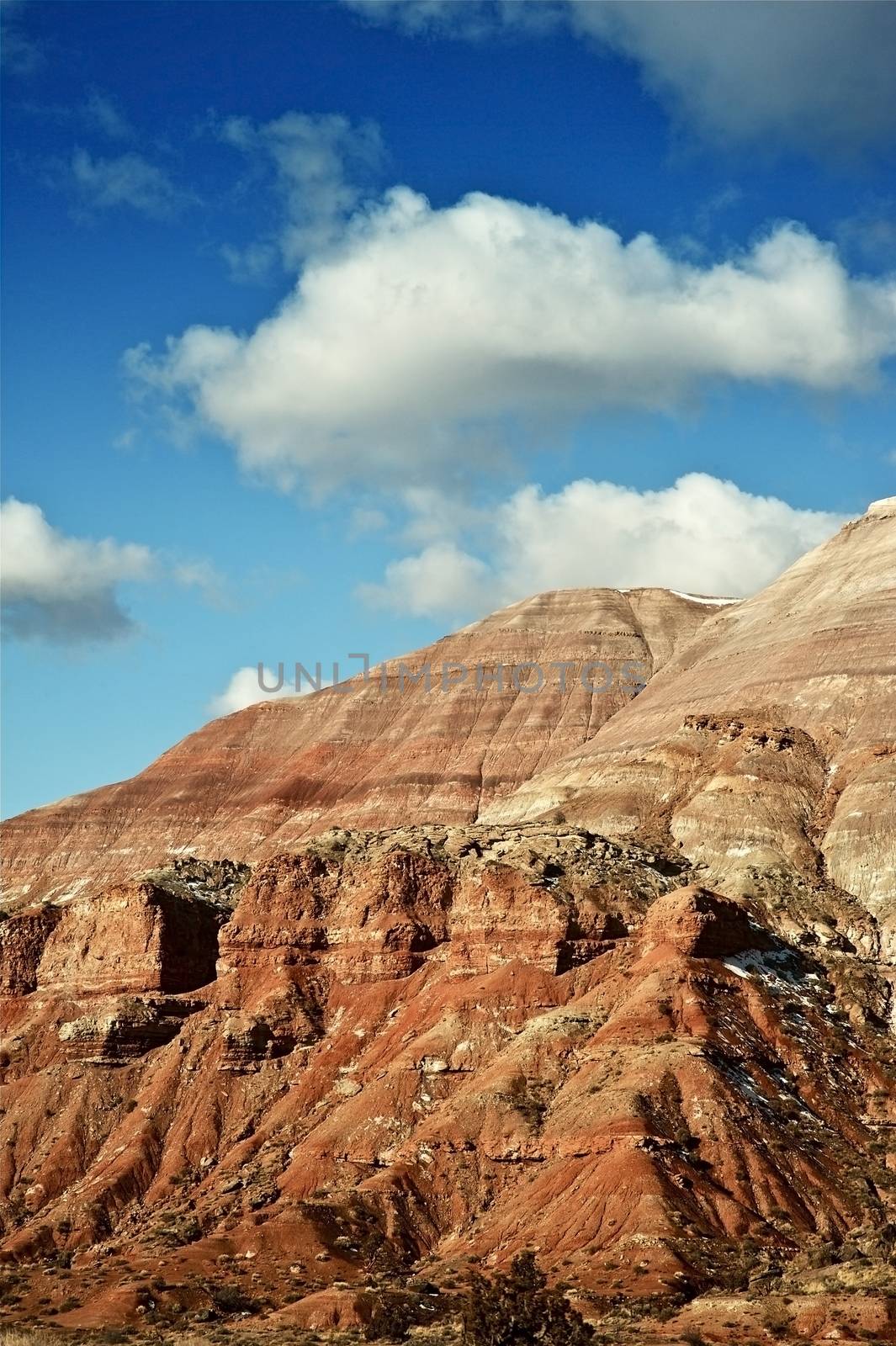 Rocky Utah Landscape and Blue Cloudy Sky. Vertical Photo. Utah Rocks Formation. Utah, USA