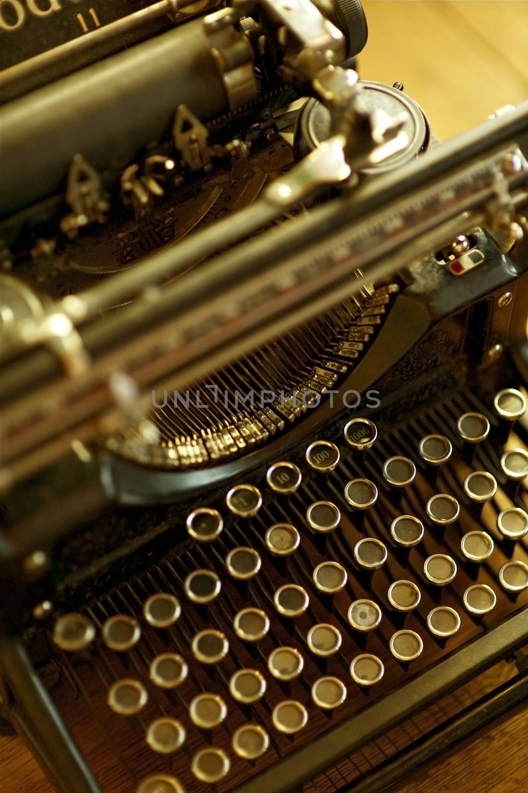 Old Typewriter Machine - Retro / Vintage Typewriter. Vertical Photo. Antique Photo Collection