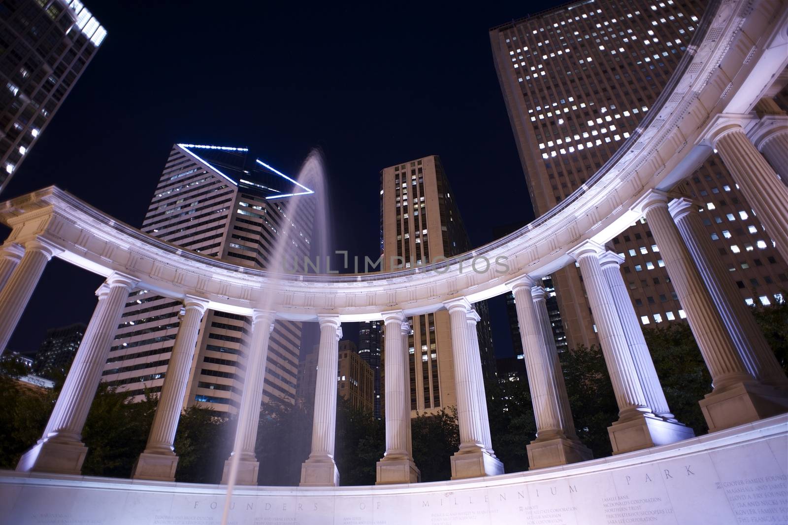 Millennium Park Founders Fountain. Millennium Park at Night. Chicago, Illinois, USA. Horizontal Wide Angle Photography. Long Exposure.